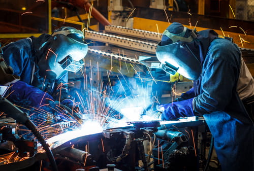 A group of welders working